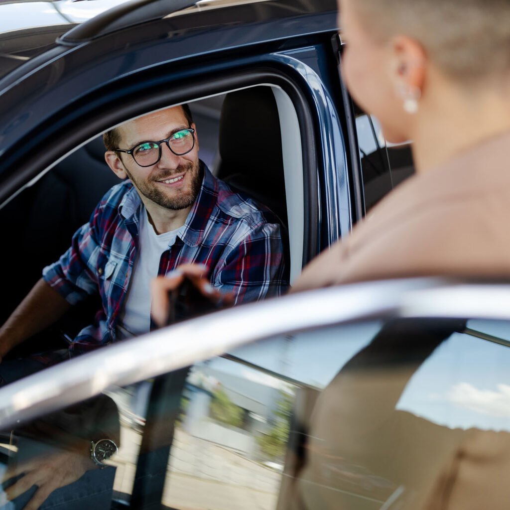 Top View Of Car Buyer Sitting In Auto Choosing New Djkmanh.jpg